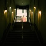 Enhancing Brownstone Hallways with Long Wall Lighting